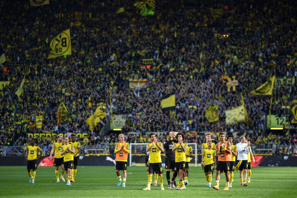 Players of Borussia Dortmund celebrate with their fans after the Bundesliga match between Borussia Dortmund and VfL Wolfsburg at Signal Iduna Park on April 16, 2022 in Dortmund, Germany. 