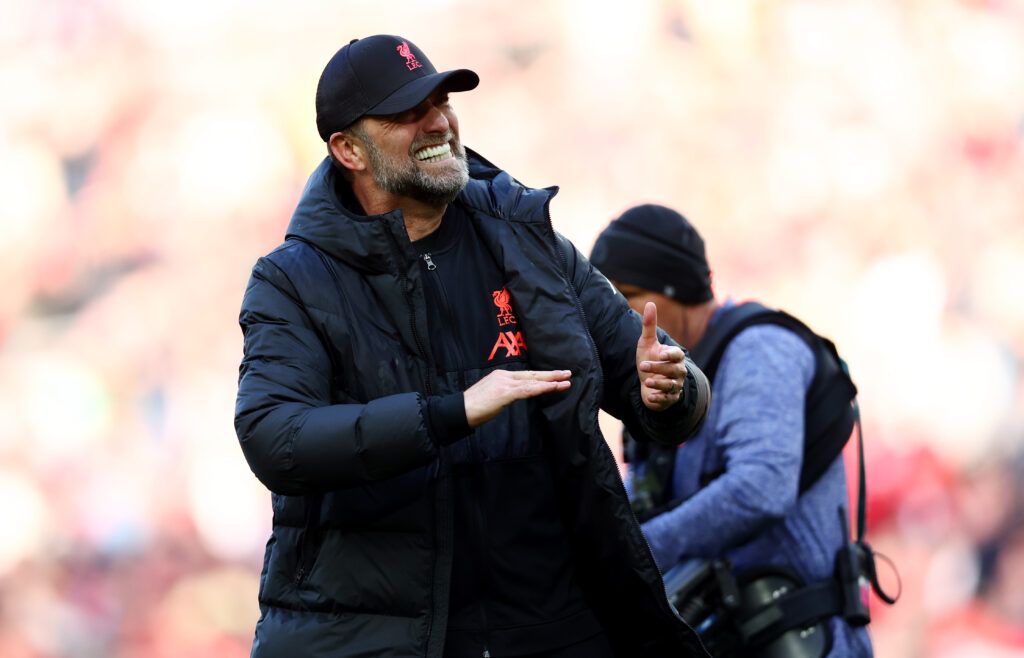 uergen Klopp, Manager of Liverpool celebrates with the fans after their sides victory during the Premier League match between Liverpool and Everton at Anfield on April 24, 2022 in Liverpool, England.