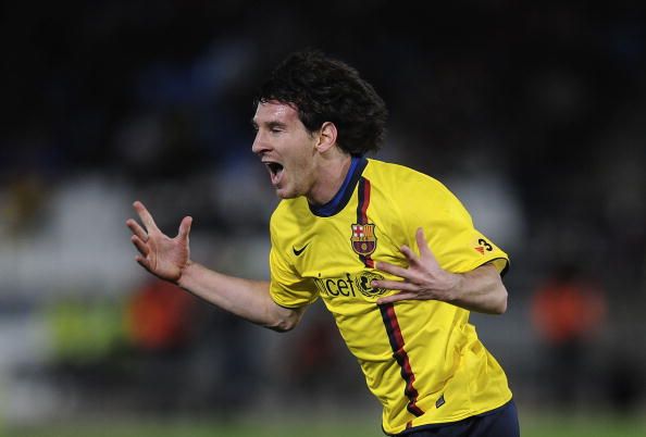 Messi celebrates for Barcelona.