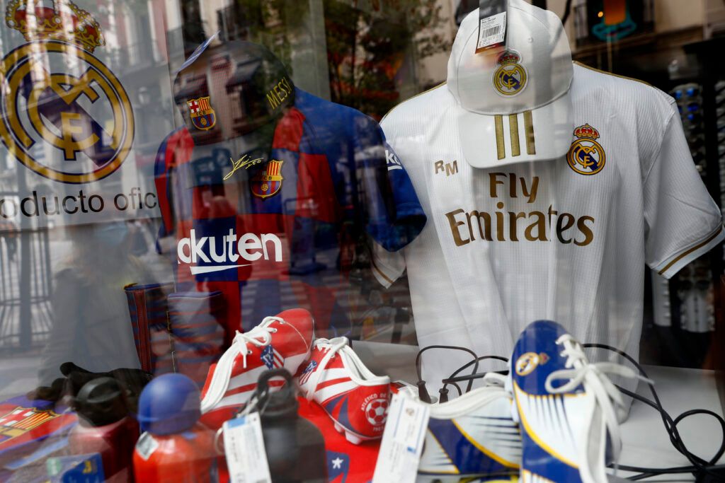 Barcelona and Real Madrid kits.