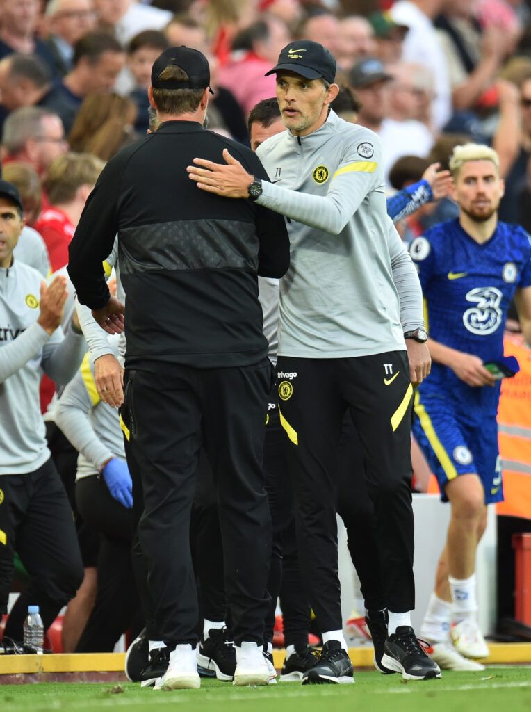Tuchel and Klopp greet each other.