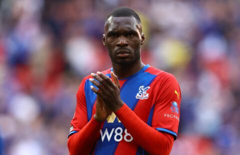 Crystal Palace's Christian Benteke had his face grabbed by an Everton fan during a pitch invasion