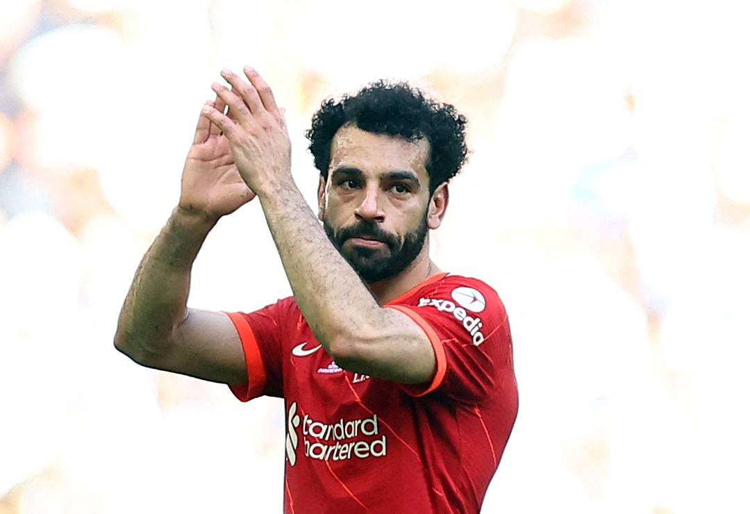 Liverpool's Salah clapping.