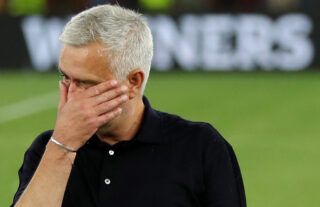 Roma's Mourinho crying.