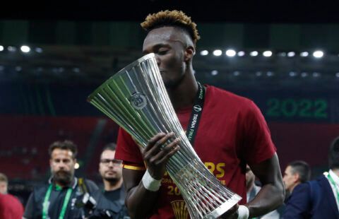 Abraham lifts the UECL trophy.