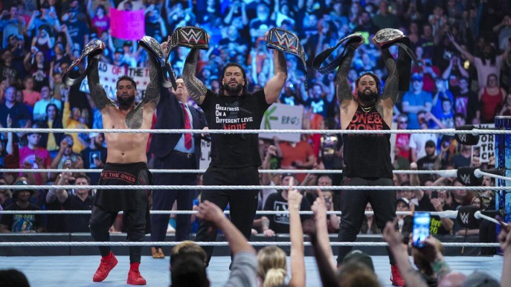 The Bloodline celebrate on SmackDown after The Usos become the Undisputed WWE Tag Team Champions