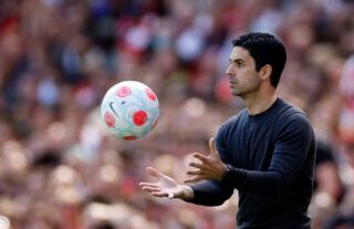 Mikel Arteta catches the ball during one of Arsenal's Premier League games
