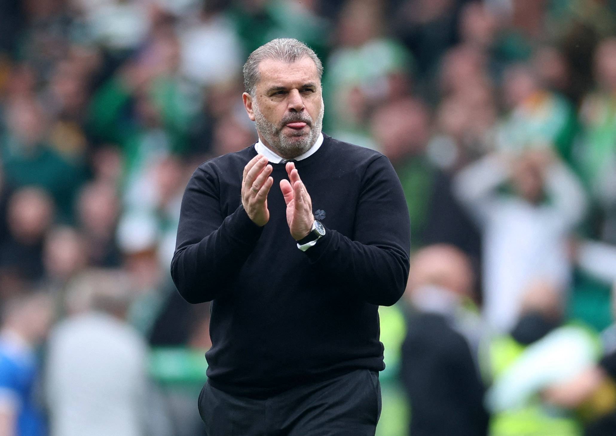 Ange Postecoglou leading Celtic out in an Old Firm derby