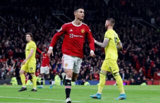 Manchester United striker Cristiano Ronaldo celebrates a goal at Old Trafford