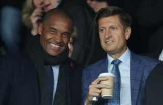 Crystal Palace chairman Steve Parish (right) and Mark Bright watch on