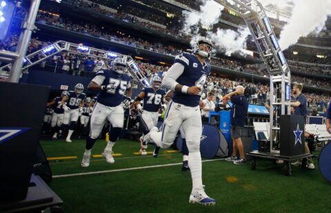 Dallas Cowboys players running out of the tunnel