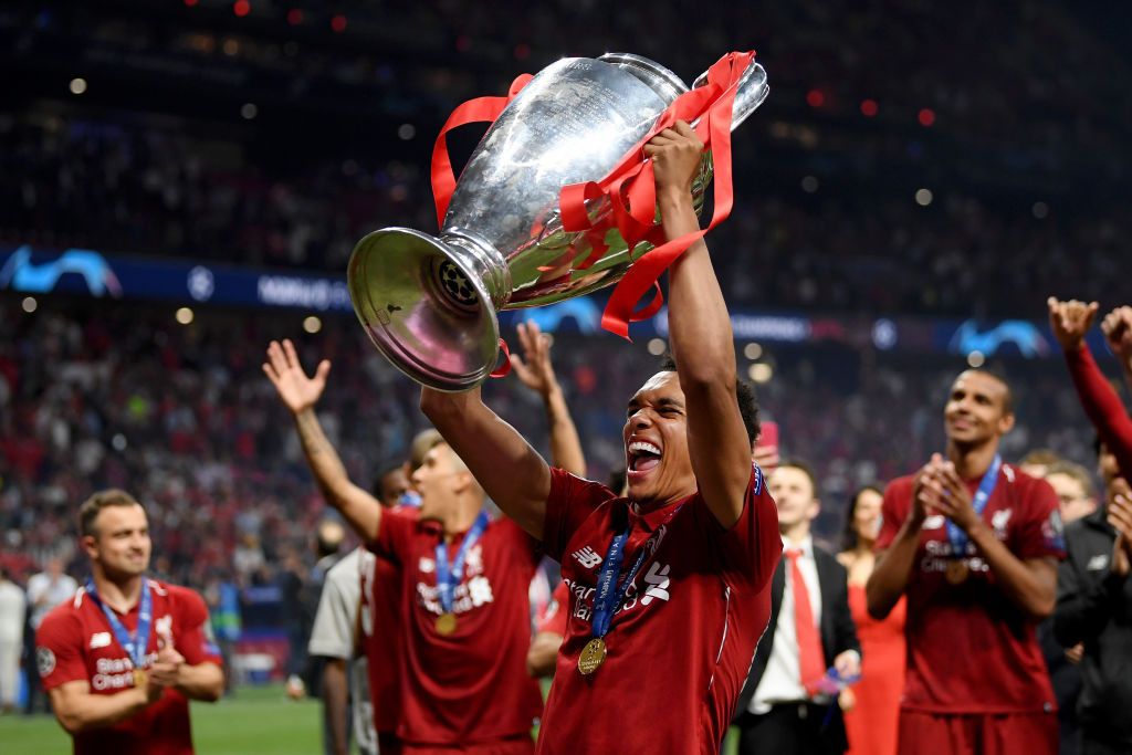 Liverpool's Trent Alexander-Arnold with the Champions League trophy