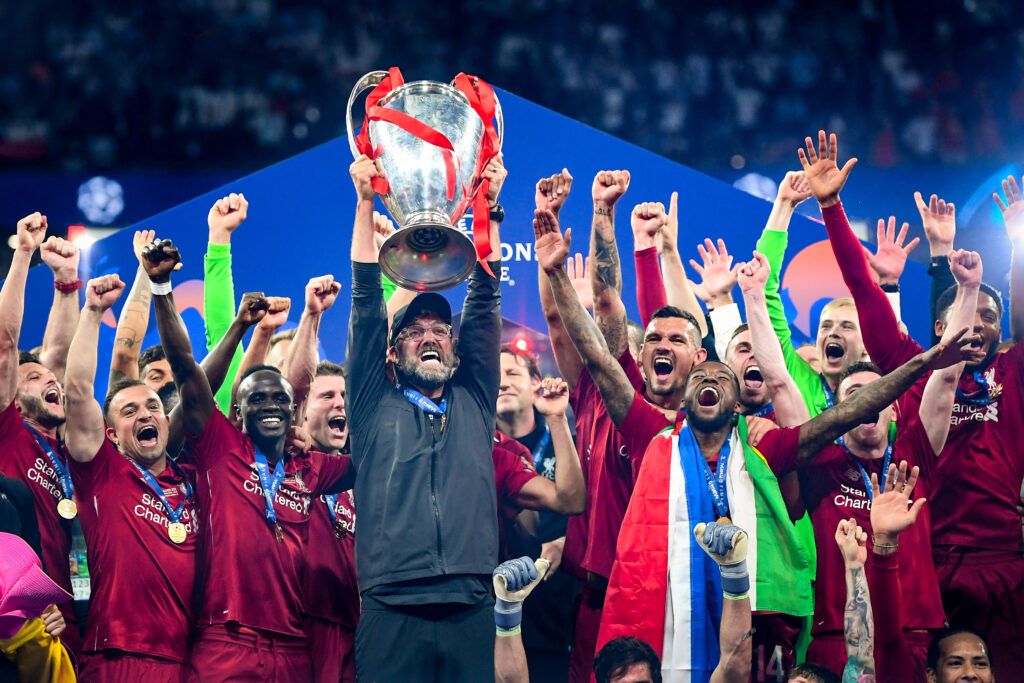 urgen Klopp, Manager of Liverpool celebrates with the Champions League Trophy after winning the UEFA Champions League Final between Tottenham Hotspur.