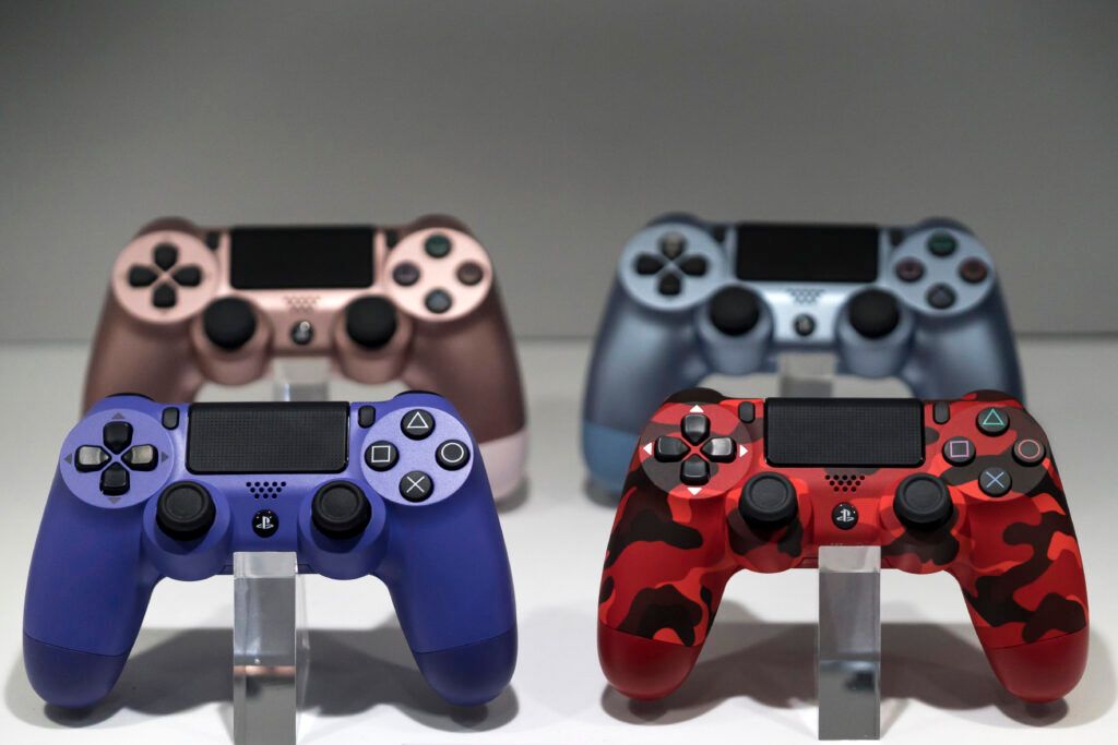 Wireless controllers for the PlayStation 4 (PS4) game console are displayed in the Sony Interactive Entertainment Inc. booth on the business day of the Tokyo Game Show 2019 at Makuhari Messe on September 12, 2019 in Chiba, Japan. The Tokyo Game Show will be open to the public on September 14 and 15, 2019. 