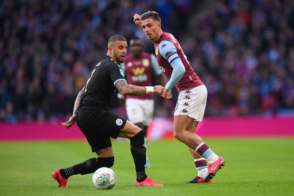 Pep Guardiola was loving it after Jack Grealish mugged off Kyle Walker during City's parade
