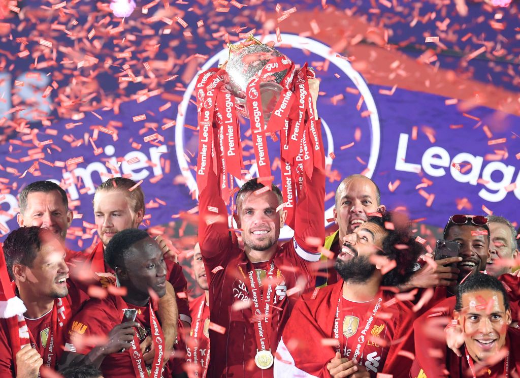 Liverpool's Jordan Henderson with the Premier League trophy