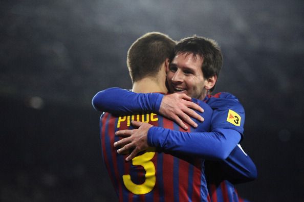 FC Barcelona v CA Osasuna - Copa Del Ray - Pique and Messi