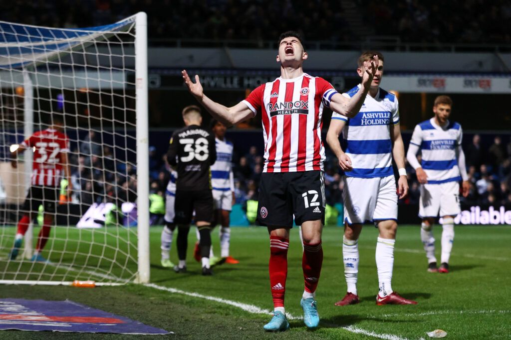ohn Egan of Sheffield United reacts after a missed chance during the Sky Bet Championship match between Queens Park Rangers and Sheffield United at The Kiyan Prince Foundation Stadium on April 29, 2022 in London, England