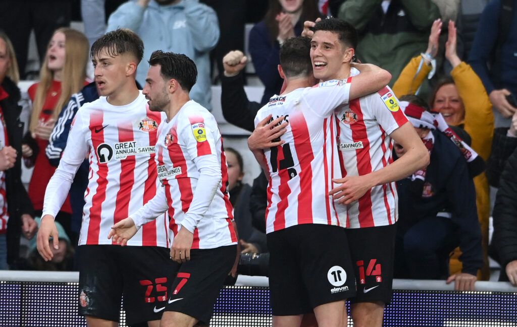 Sunderland player Ross Stewart (r) celebrates with team mates after scoring the opening goal during the Sky Bet League One Play-Off Semi Final 1st Leg match between Sunderland and Sheffield Wednesday at Stadium of Light on May 06, 2022 in Sunderland, England.