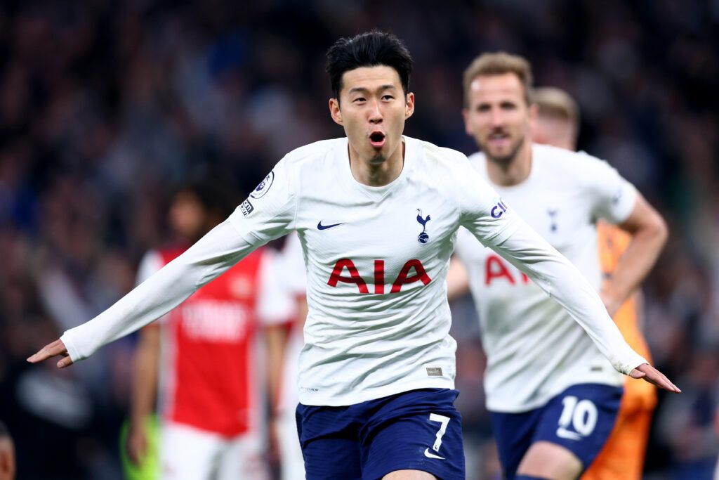 Heung-Min Son of Tottenham Hotspur celebrates after scoring their side's third goal during the Premier League match between Tottenham Hotspur and Arsenal at Tottenham Hotspur Stadium on May 12, 2022 in London, England