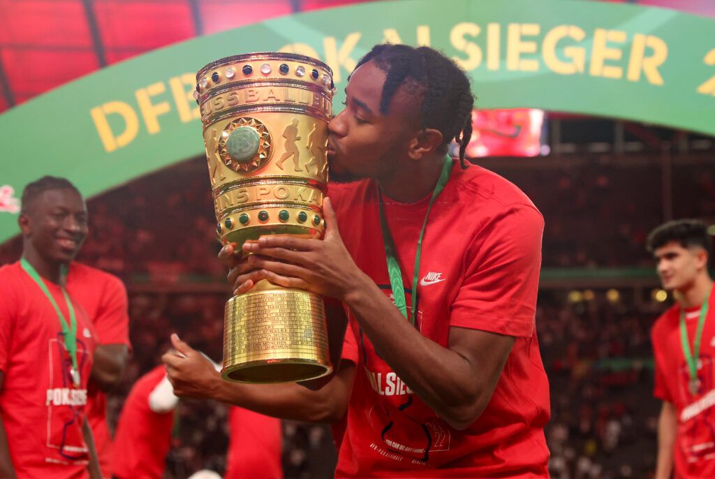Christopher Nkunku with the DFB Cup trophy.