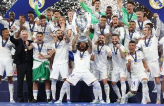 Real Madrid players celebrate winning the 2021/22 Champions League