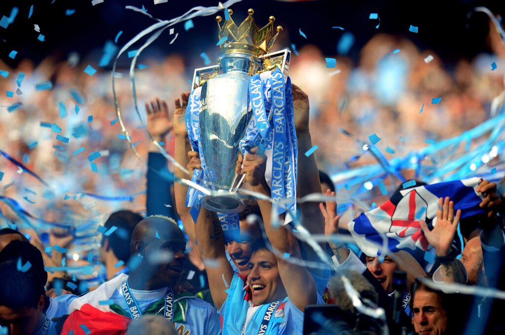 Aguero's Man City with Premier League trophy, 2012