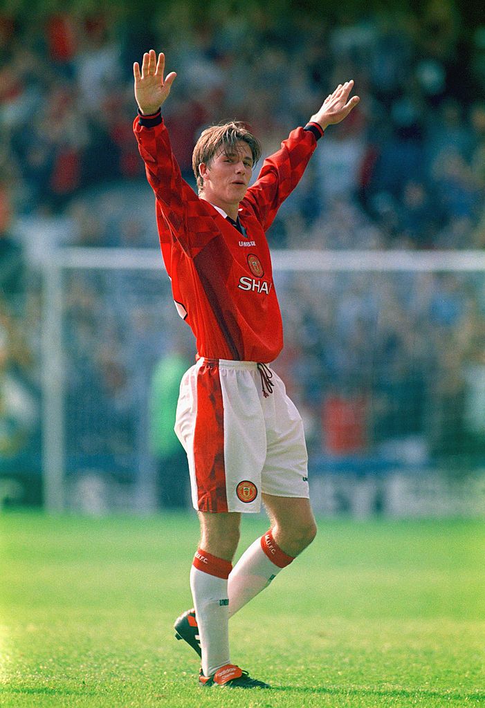 David Beckham celebrates scoring a goal for Man Utd