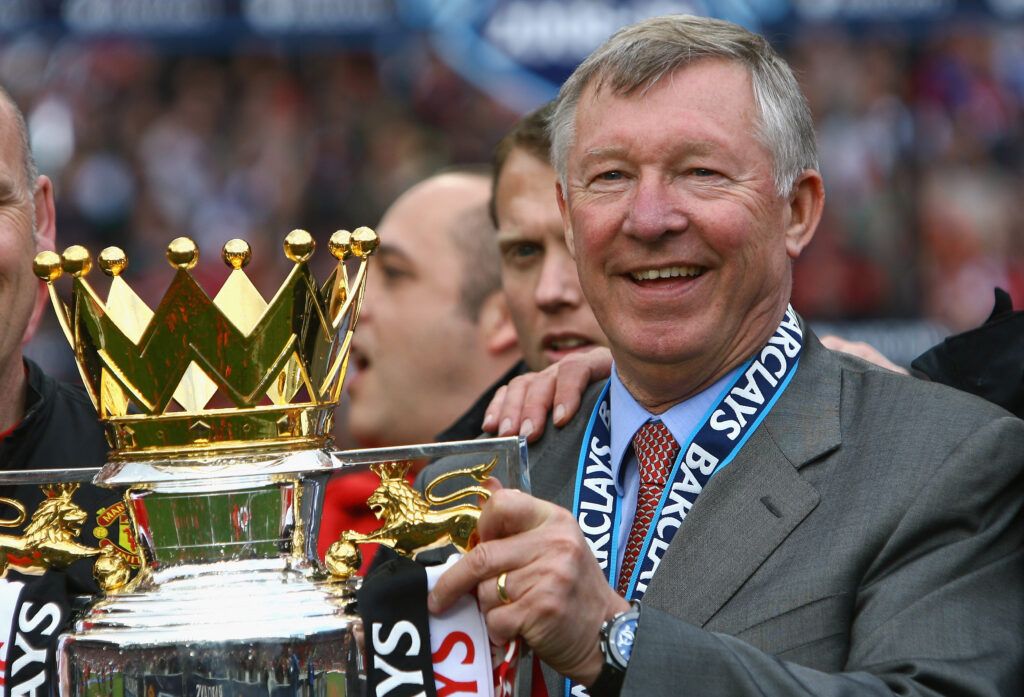 Sir Alex Ferguson with the Premier League trophy