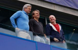 Incoming Chelsea owner Todd Boehly (centre) watches on