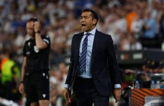 Rangers boss Giovanni van Bronckhorst giving instructions to his players