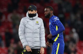 Chelsea manager Thomas Tuchel talking to Antonio Rudiger on the pitch