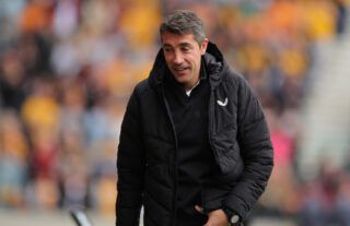Wolves manager Bruno Lage laughing on the touchline