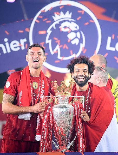 Lovren and Salah celebrate.