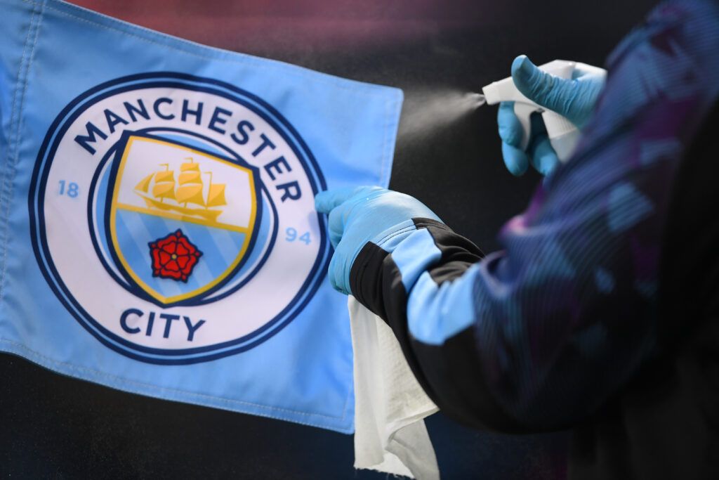 Man City's club badge on a corner flag.
