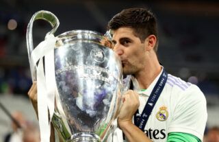 Courtois with the Champions League trophy.