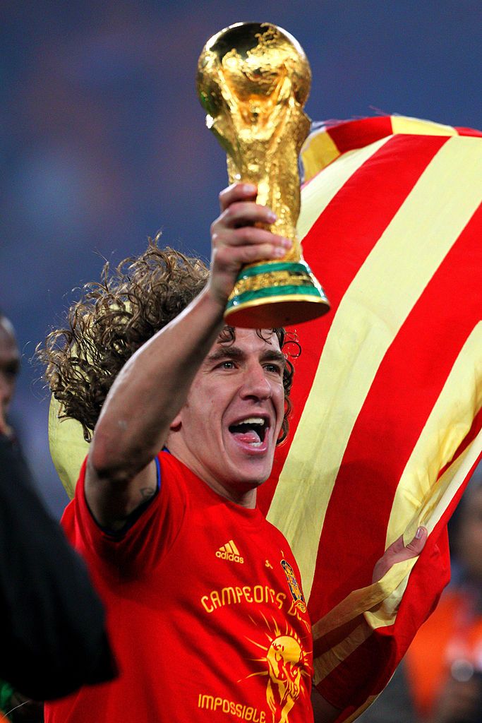 Carles Puyol with the World Cup trophy