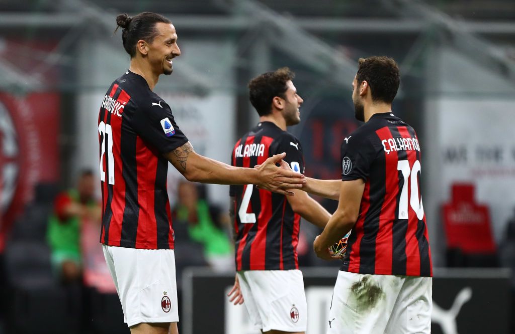 Zlatan Ibrahimovic and Hakan Calhanoglu in action for AC Milan