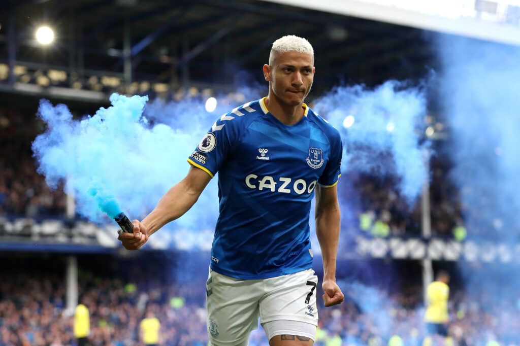 Richarlison celebrates against Liverpool with a smoke bomb