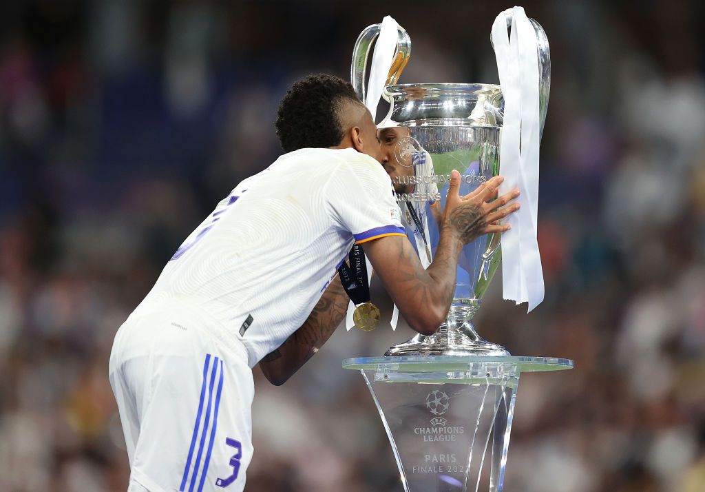 Eder Militao with the Champions League trophy