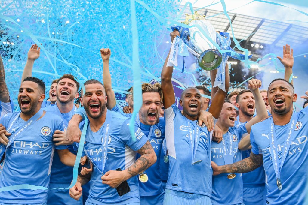 Fernandinho of Manchester City lifts the Premier League 