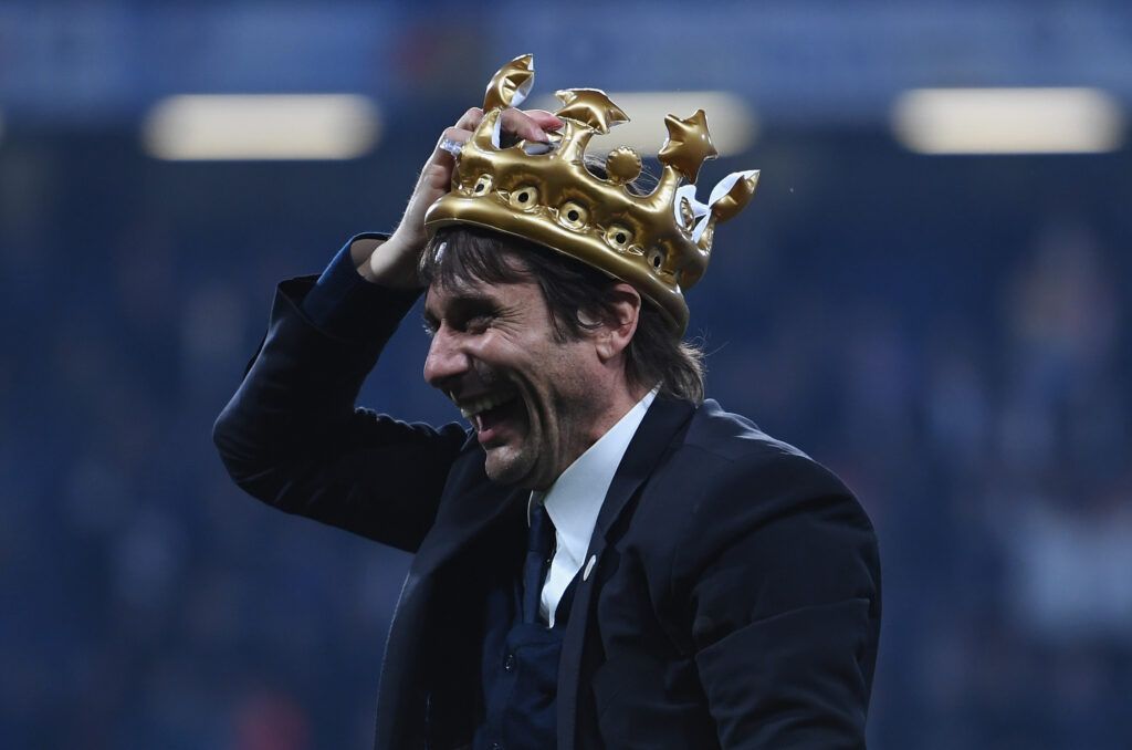 Conte celebrates with a crown on his head
