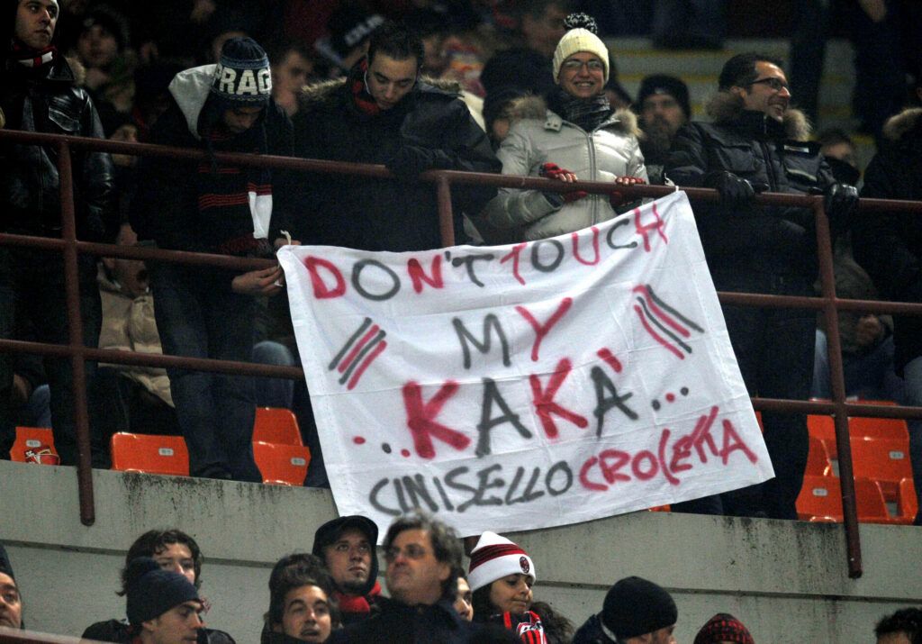 Milan fans hold up a banner to convince Kaka to stay at the club