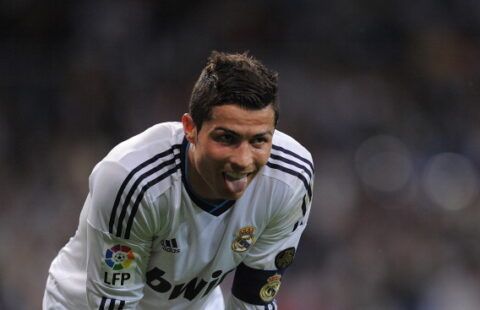 Ronaldo sticks his tongue out.