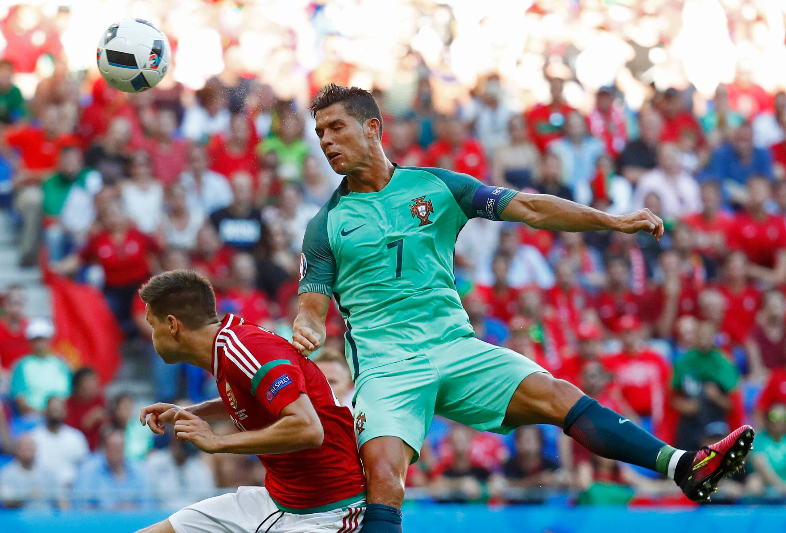 Ronaldo heads the ball.