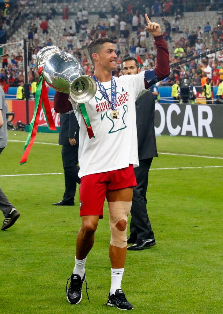 Ronaldo with the Euros trophy.