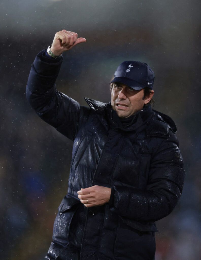 Tottenham's Conte in the rain.