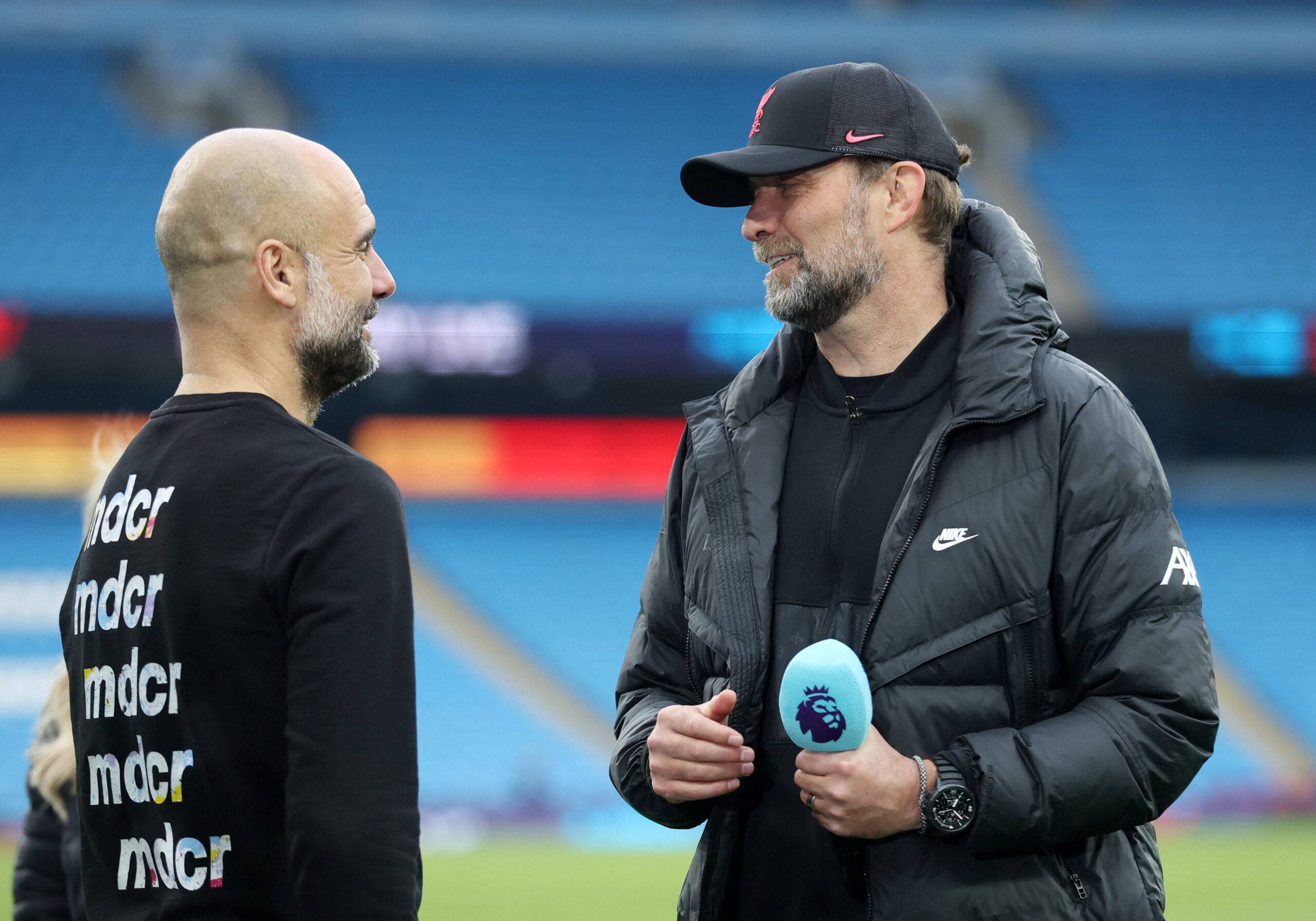Guardiola and Klopp chat.