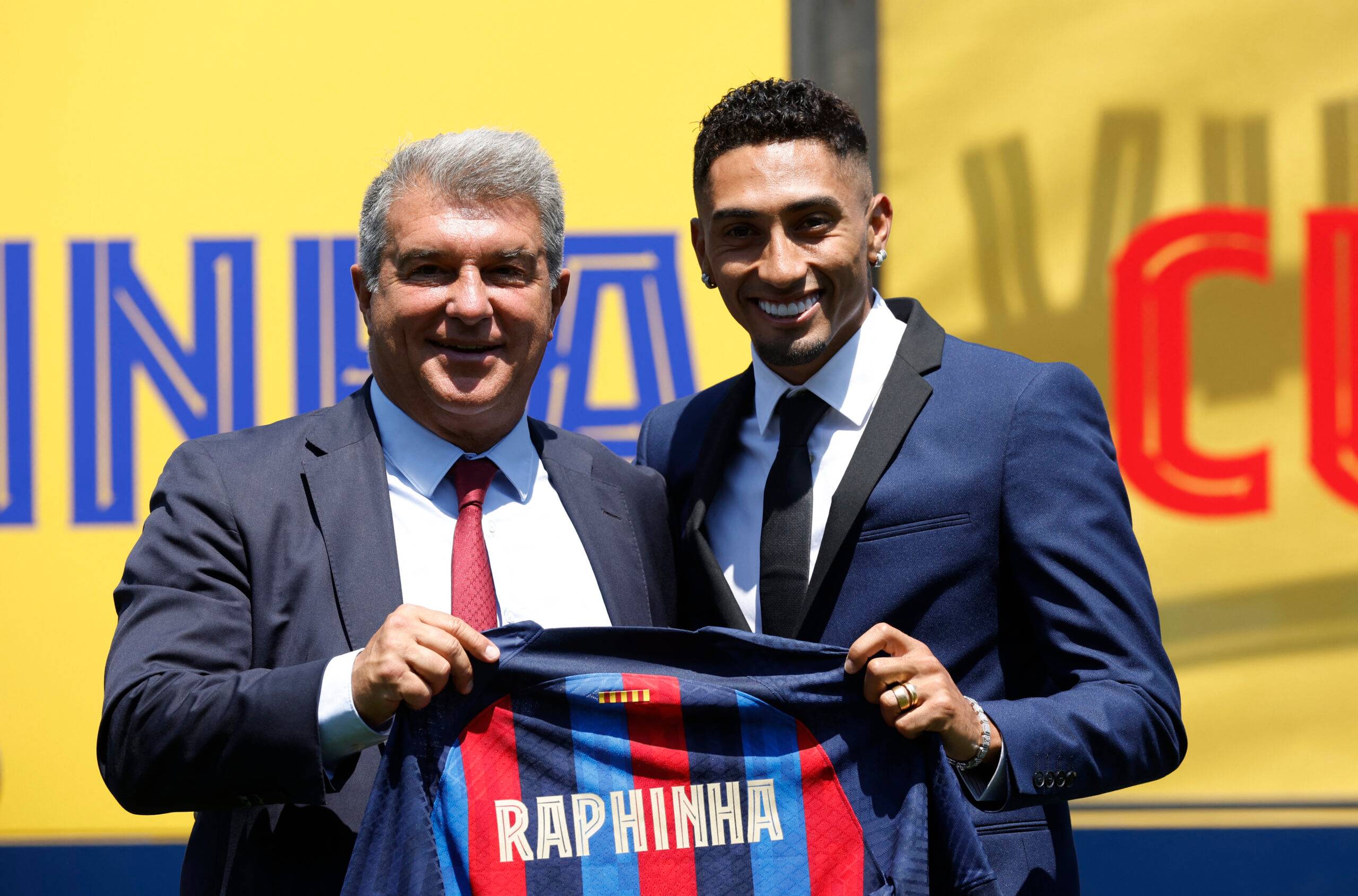 Raphinha signs for Barcelona.
