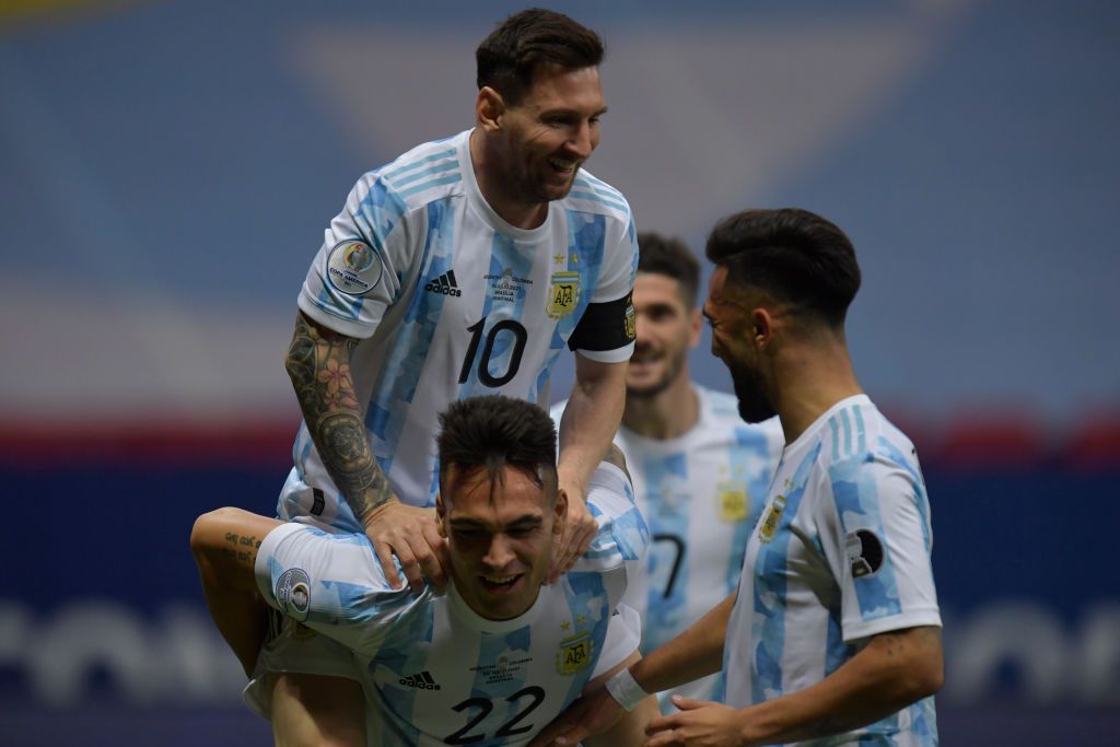 Lionel Messi celebrates Argentina's goal vs Colombia